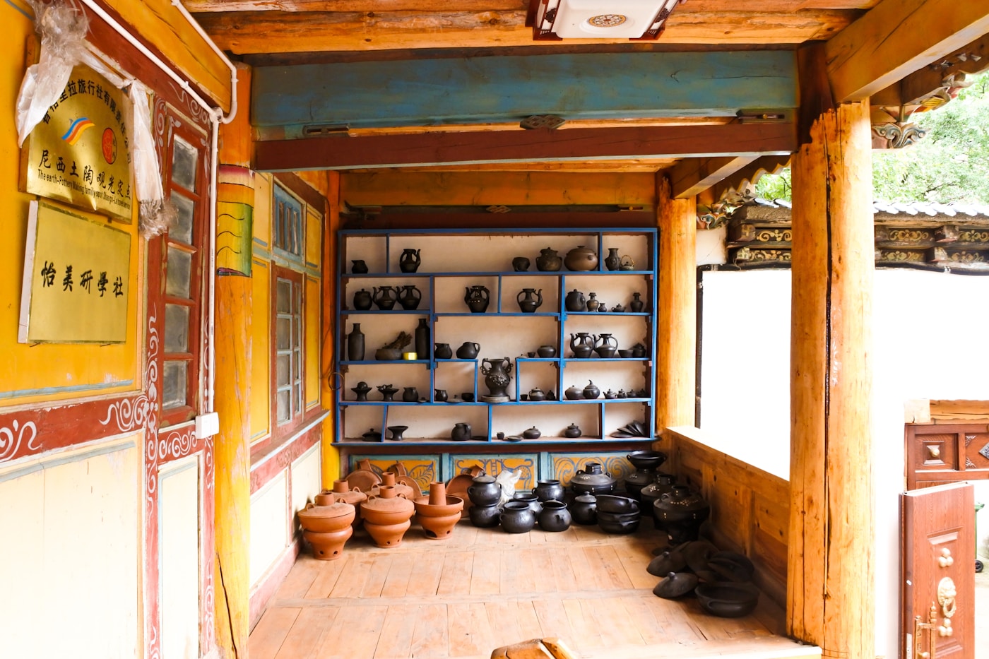 Pottery drying on the shelves of a partner workshop